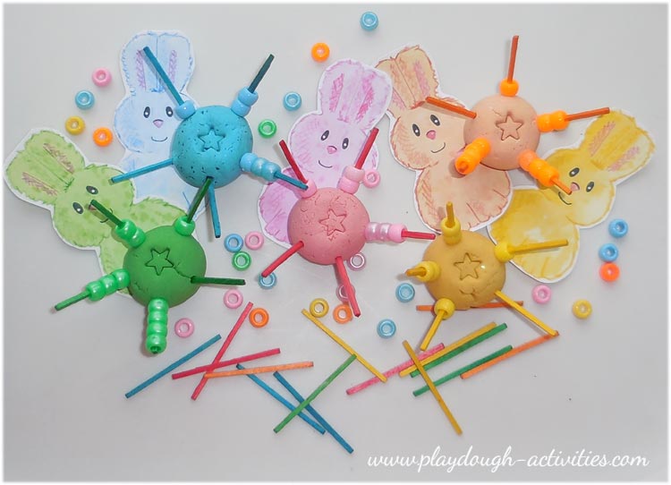 Easter playdough bead threading activity idea
