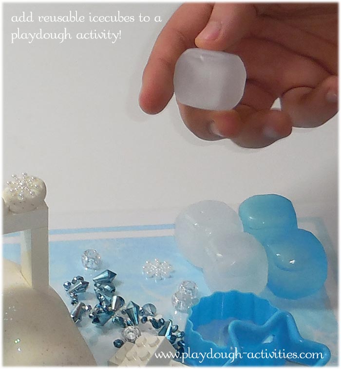 Add reusable icecubes to frozen themed playdough activity