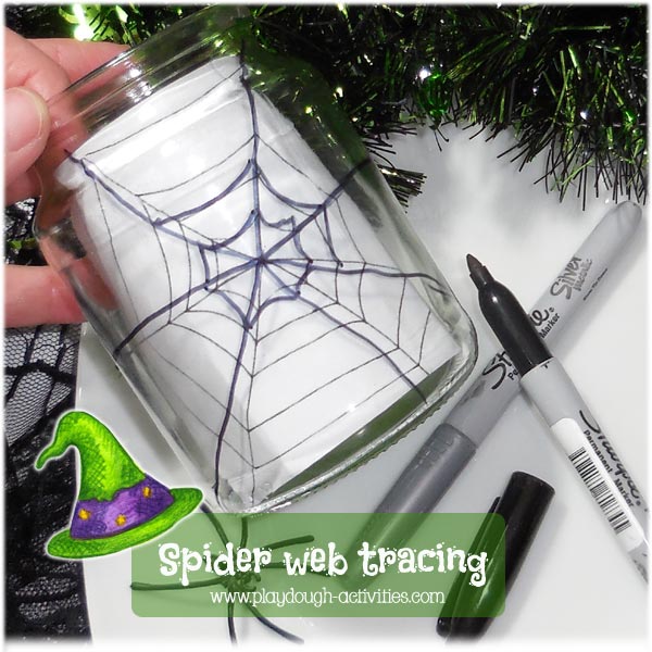 Tracing spider web lines onto glass jars