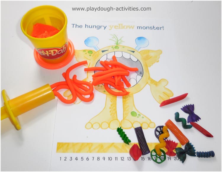 Feeding play-doh spaghetti and pasta shapes to Hungry Monsters
