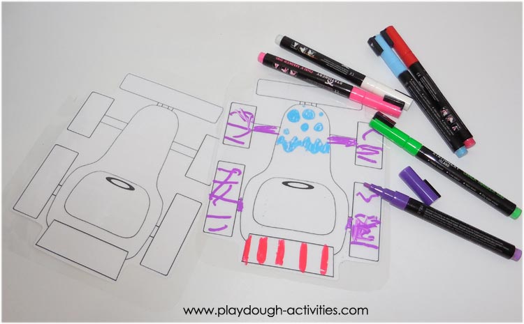 colouring in racing cars with chalk marker pens