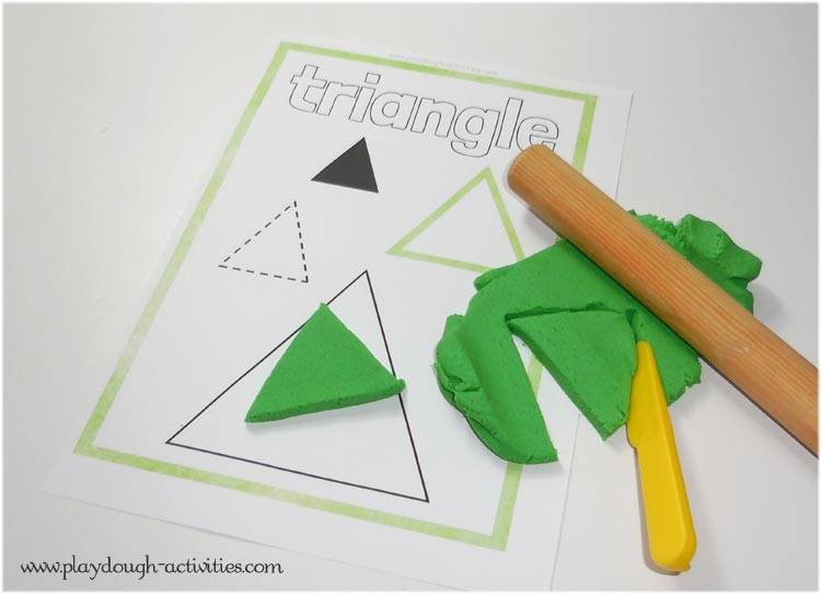 Triangle shaped mathematics activity using playdough for nursery aged children's learning