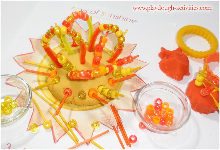 Sun playdough threading activity for the summer holiday