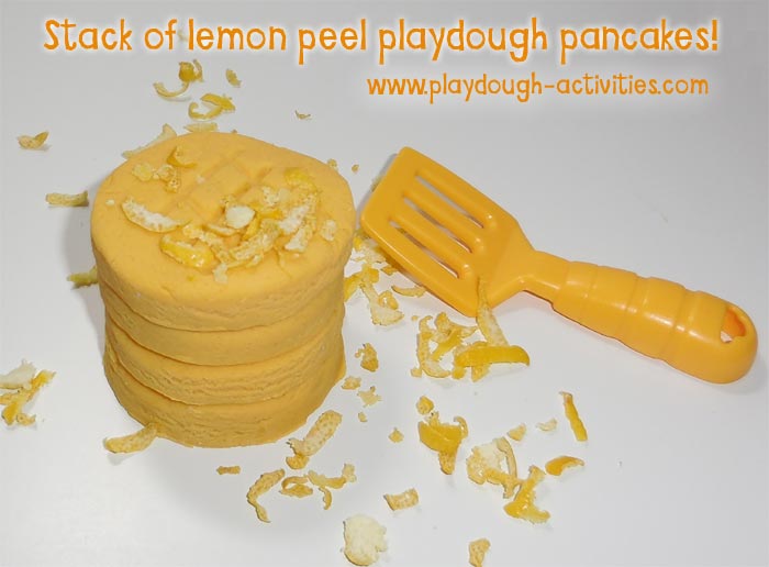 stack of playdough pancakes with lemon peel topping