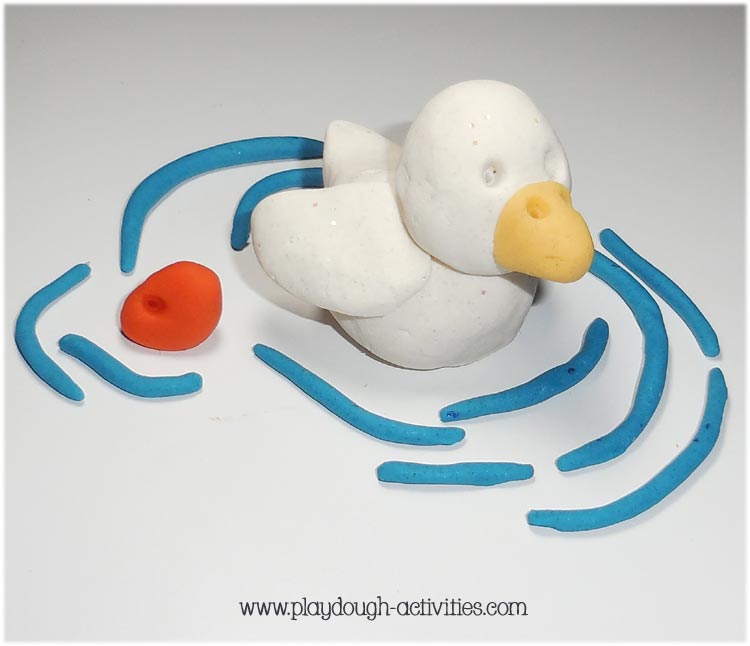 Simple playdough creations a duck on a pond of ripples